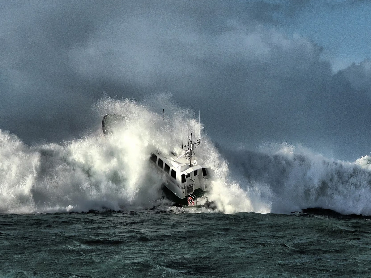 Twin hull hydrofoiling catamaran smashes big wave storm8