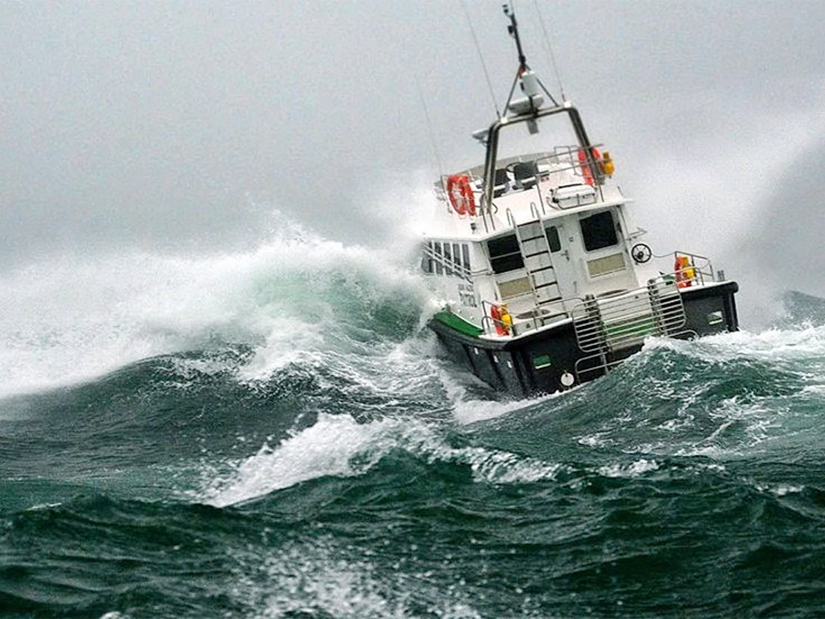 Twin hull hydrofoiling catamaran smashes big wave storm9