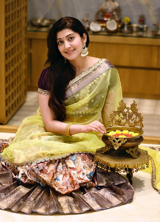 Actress Pranitha Traditional photos in Golden saree11