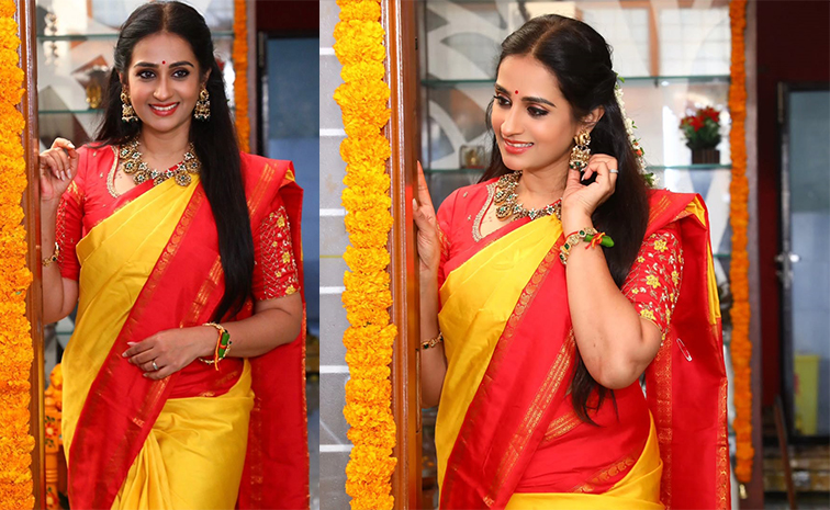 Actress Layagorty Favourite Yellow And Red Saree Look1