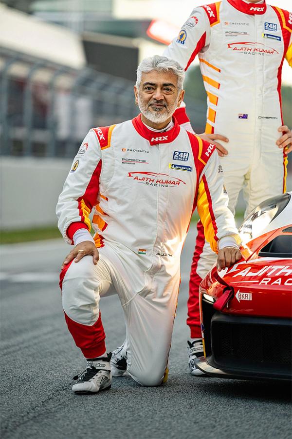 Ajith Kumar Poses with His Race Car At Barcelona F1 Circuit11