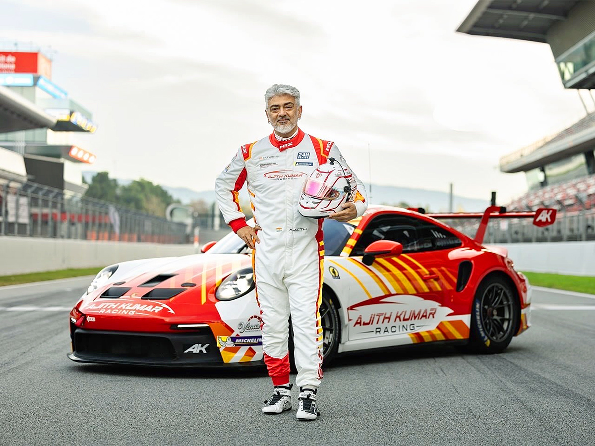 Ajith Kumar Poses with His Race Car At Barcelona F1 Circuit2