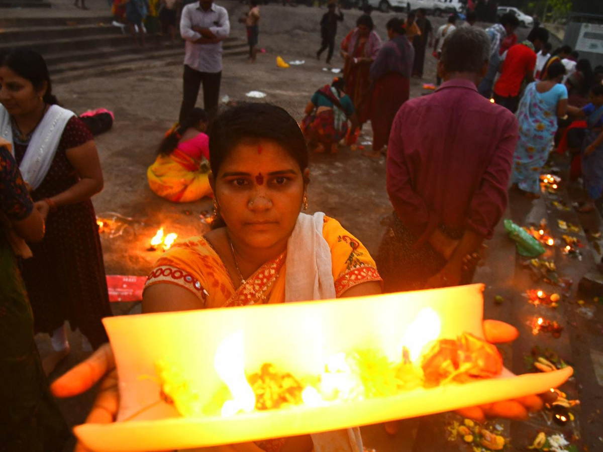 Devotees Rush At Vijayawada Punnami Ghat To Offer Karthika Masam Prayers14