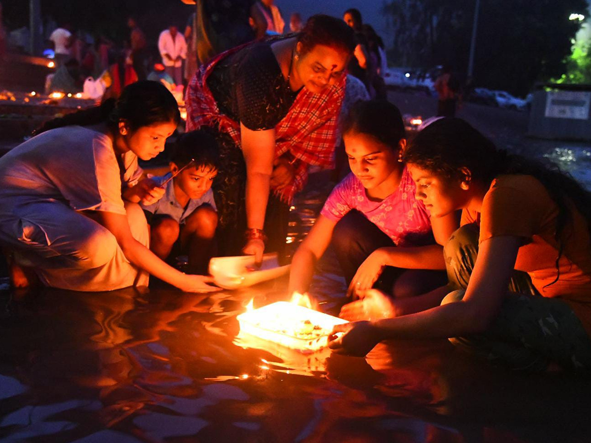 Devotees Rush At Vijayawada Punnami Ghat To Offer Karthika Masam Prayers17