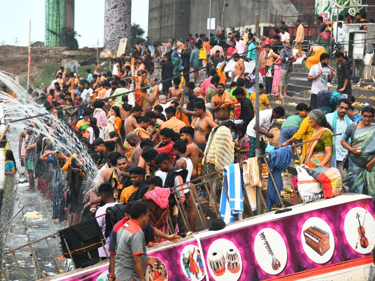 Devotees Rush At Vijayawada Punnami Ghat To Offer Karthika Masam Prayers7