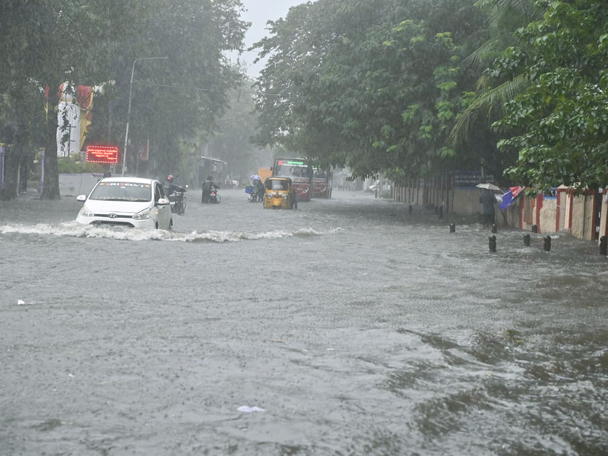 Cyclone Fengal : Heavy Rain Causes Waterlogging In Chennai Photos21