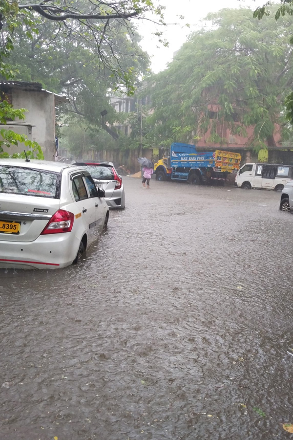 Cyclone Fengal : Heavy Rain Causes Waterlogging In Chennai Photos23