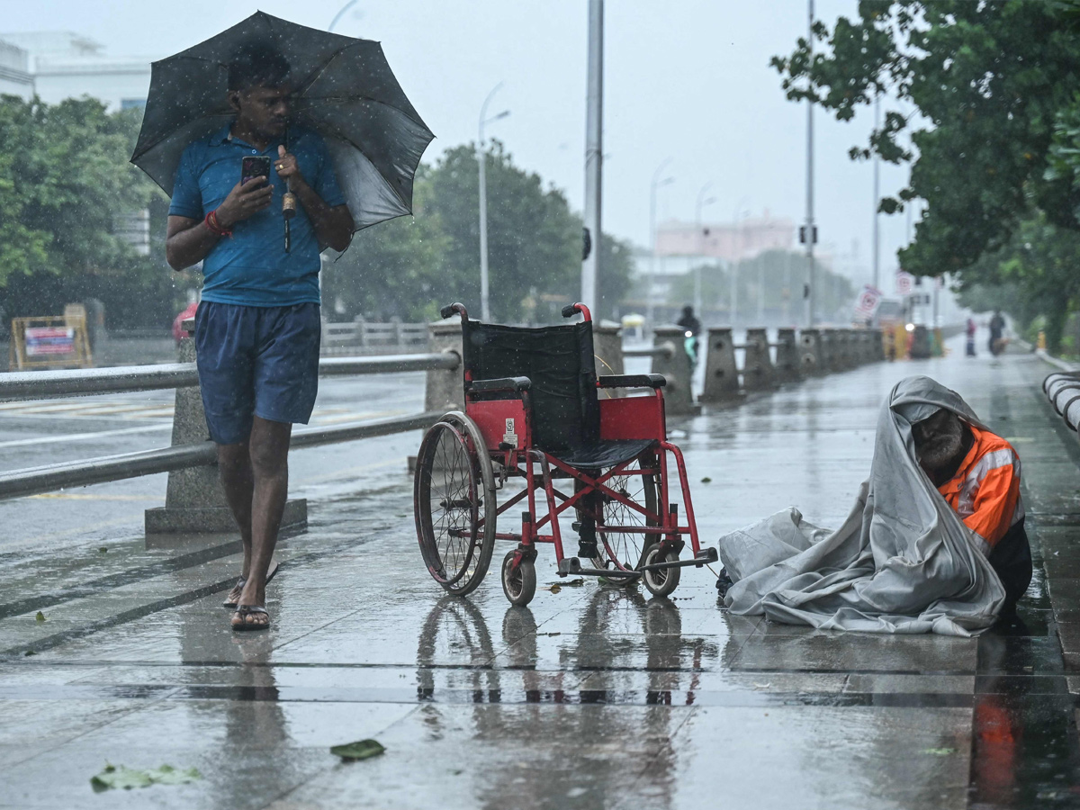 Cyclone Fengal : Heavy Rain Causes Waterlogging In Chennai Photos5