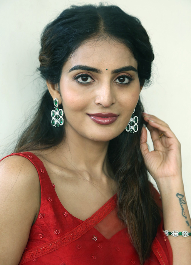 Actress Ananya Nagalla Latest Stills In Red Saree, Photos Gallery Goes Viral15