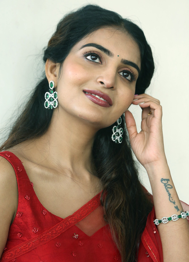 Actress Ananya Nagalla Latest Stills In Red Saree, Photos Gallery Goes Viral16