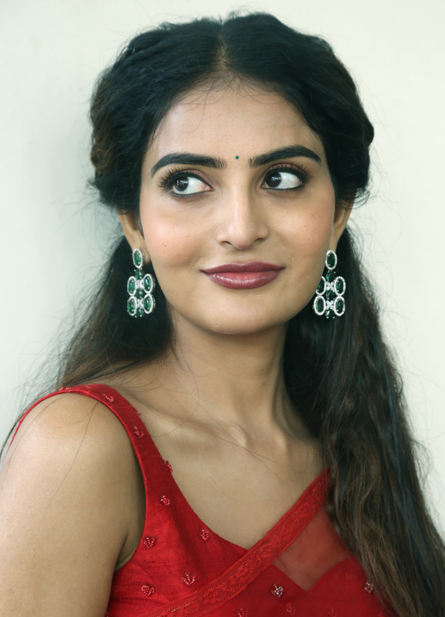 Actress Ananya Nagalla Latest Stills In Red Saree, Photos Gallery Goes Viral18