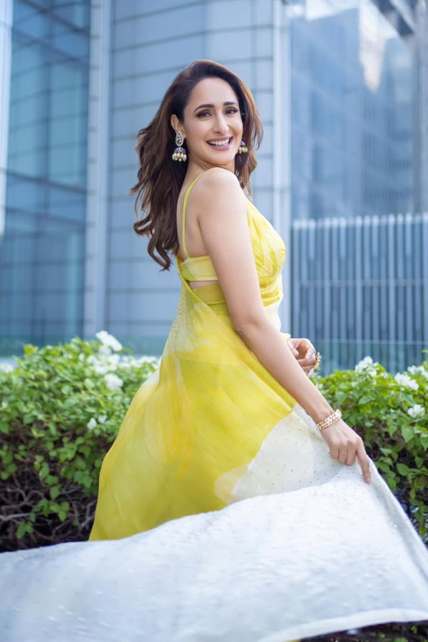 Actress Pragya Jaiswal Adorable Looks In Yellow Saree4