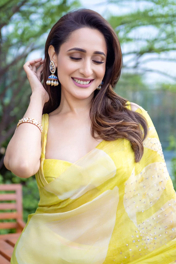 Actress Pragya Jaiswal Adorable Looks In Yellow Saree6