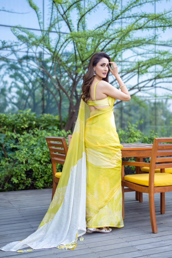 Actress Pragya Jaiswal Adorable Looks In Yellow Saree7