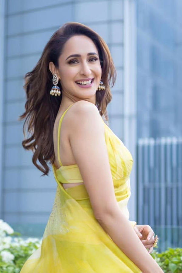 Actress Pragya Jaiswal Adorable Looks In Yellow Saree9