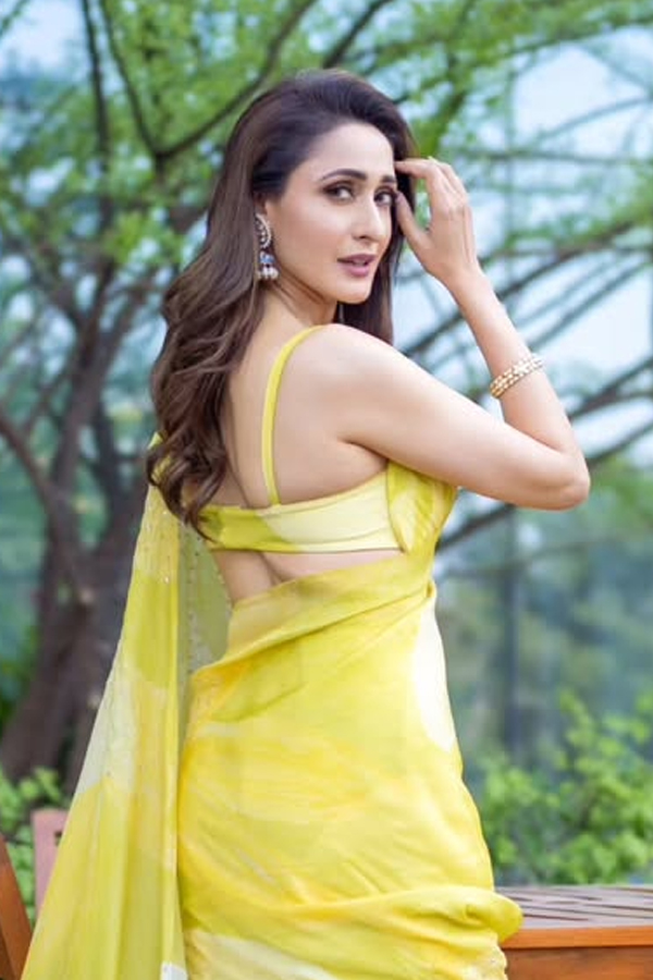 Actress Pragya Jaiswal Adorable Looks In Yellow Saree10