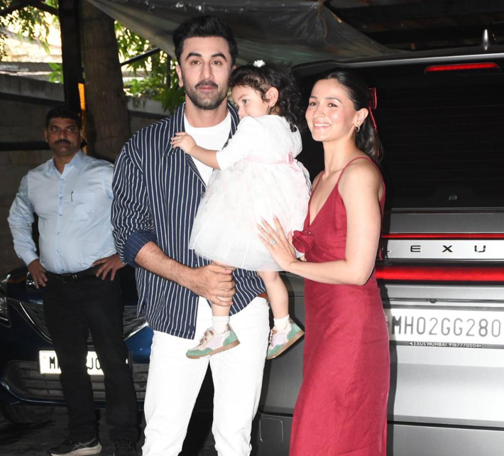 Actor Ranbir Kapoor with his daughter Raha Kapoor poses for pictures11