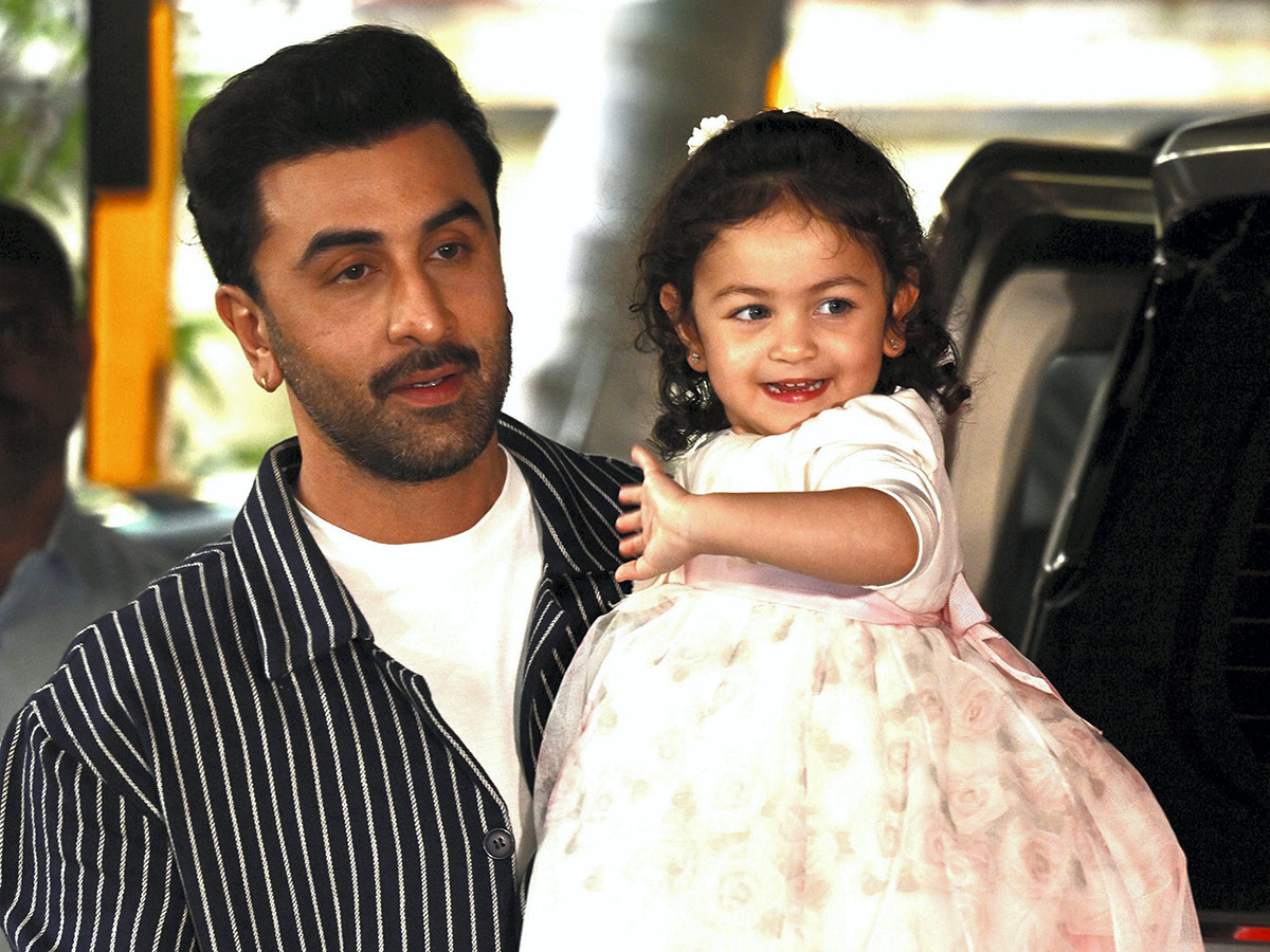 Actor Ranbir Kapoor with his daughter Raha Kapoor poses for pictures5