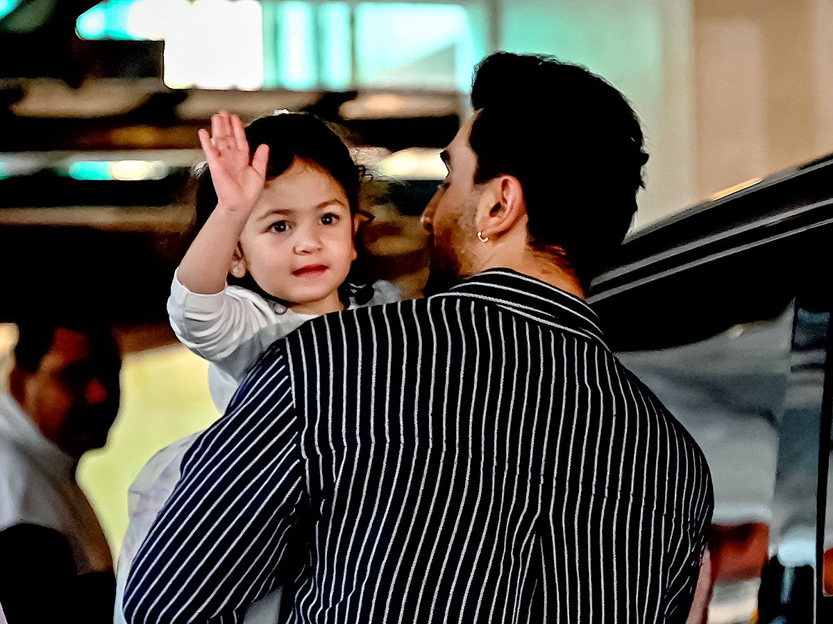 Actor Ranbir Kapoor with his daughter Raha Kapoor poses for pictures7