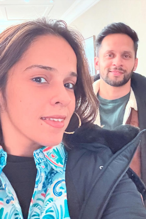 Indian Badminton star Saina Nehwal traveling Abroad with her husband Photos19