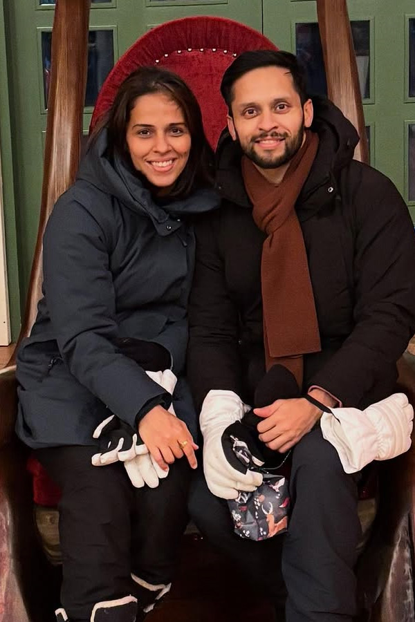 Indian Badminton star Saina Nehwal traveling Abroad with her husband Photos7