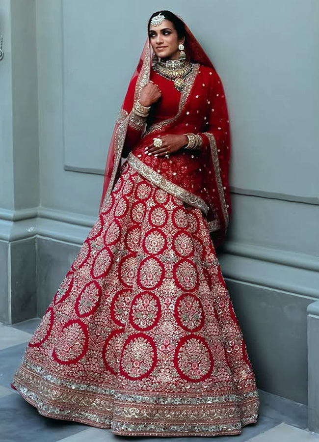 Do you know the details of this designer lehenga that was worn by PV Sindhu at her wedding2