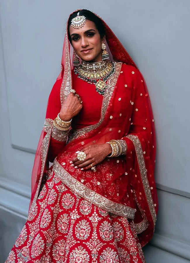 Do you know the details of this designer lehenga that was worn by PV Sindhu at her wedding11