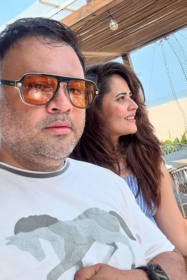 Anasuya Bharadwaj enjoys a vacation with her family Photos Viral11