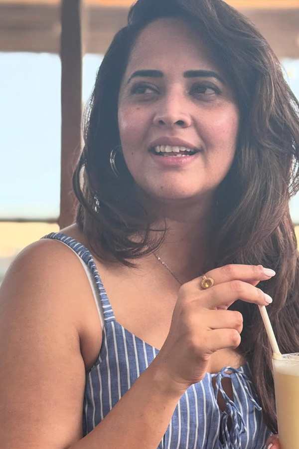 Anasuya Bharadwaj enjoys a vacation with her family Photos Viral6