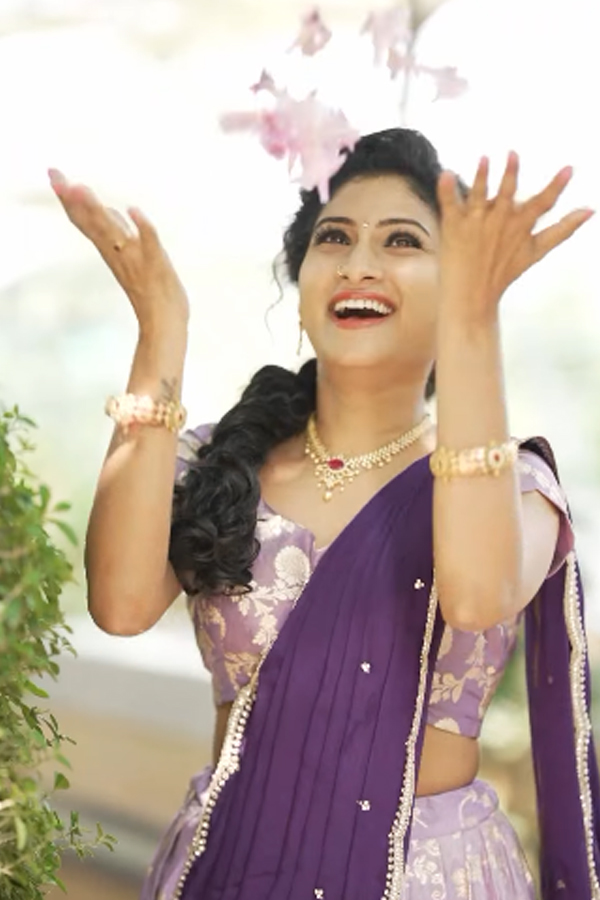 TV Actress Vishnu Priya Glamorous Photos In Purple Lehenga12