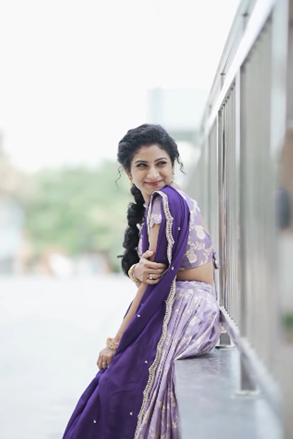 TV Actress Vishnu Priya Glamorous Photos In Purple Lehenga11