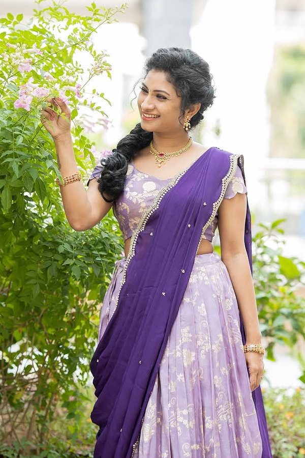 TV Actress Vishnu Priya Glamorous Photos In Purple Lehenga5