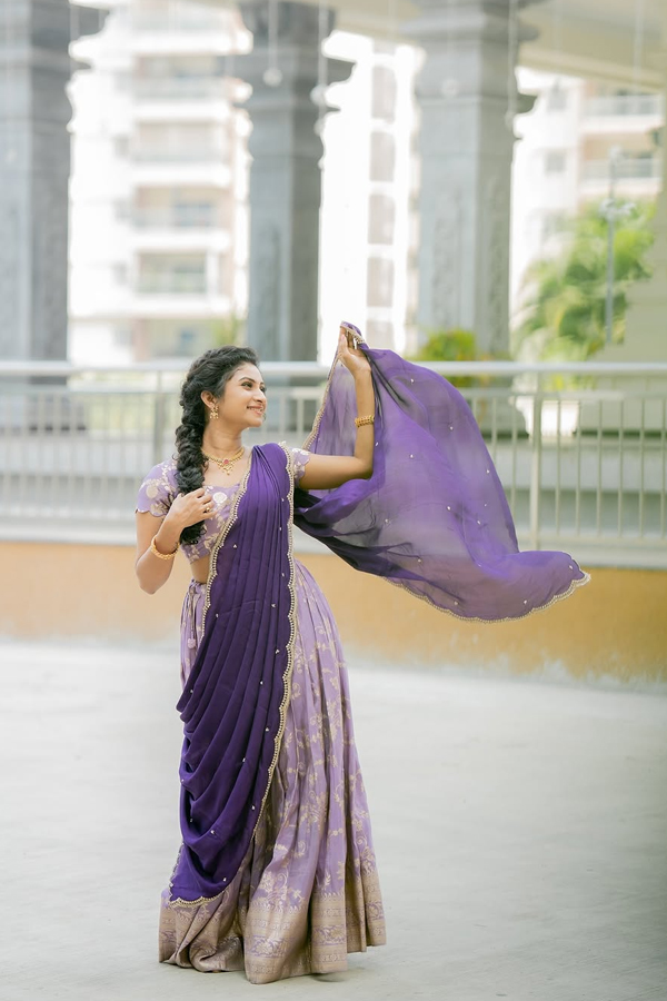 TV Actress Vishnu Priya Glamorous Photos In Purple Lehenga7