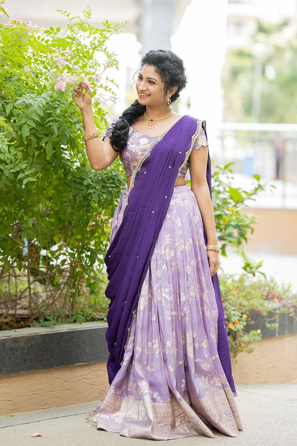 TV Actress Vishnu Priya Glamorous Photos In Purple Lehenga10