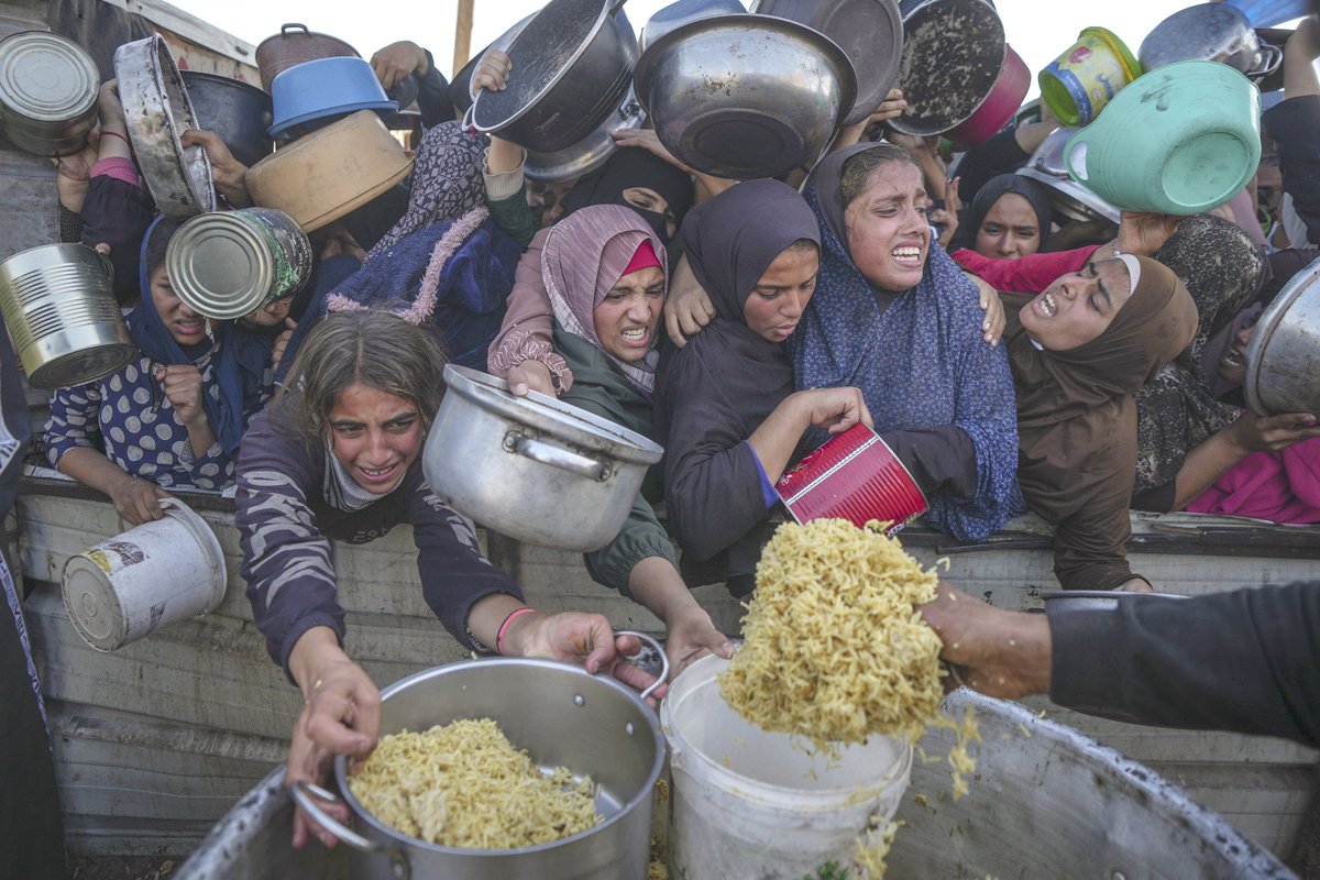 As Hunger Surges in Gaza, the Struggle to Find Food Turns Deadly22