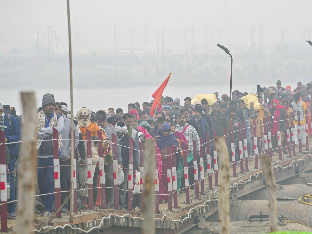 Maha Kumbh 2025 Begins in Prayagraj with Grand First Snan Photos11