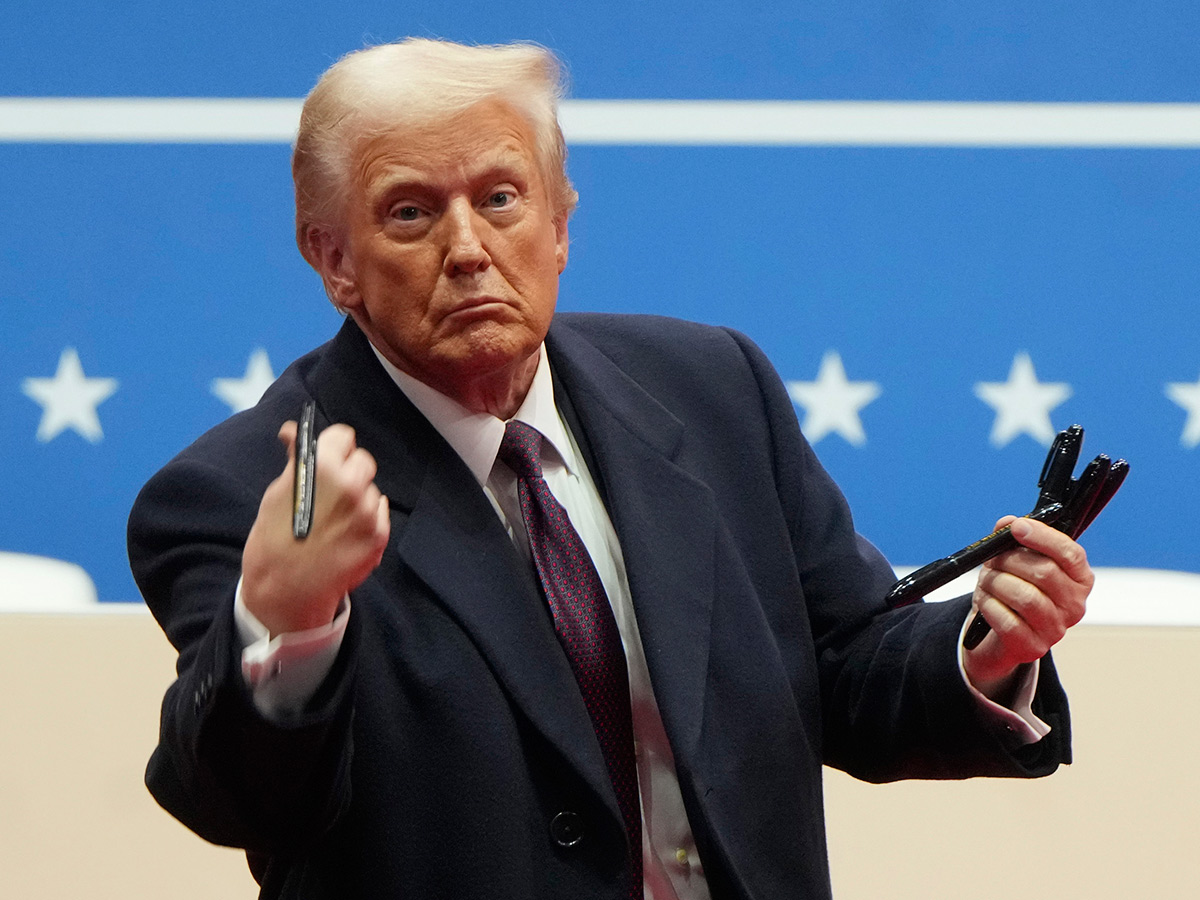 President Donald Trump arrives at an indoor Inauguration parade in Washington13