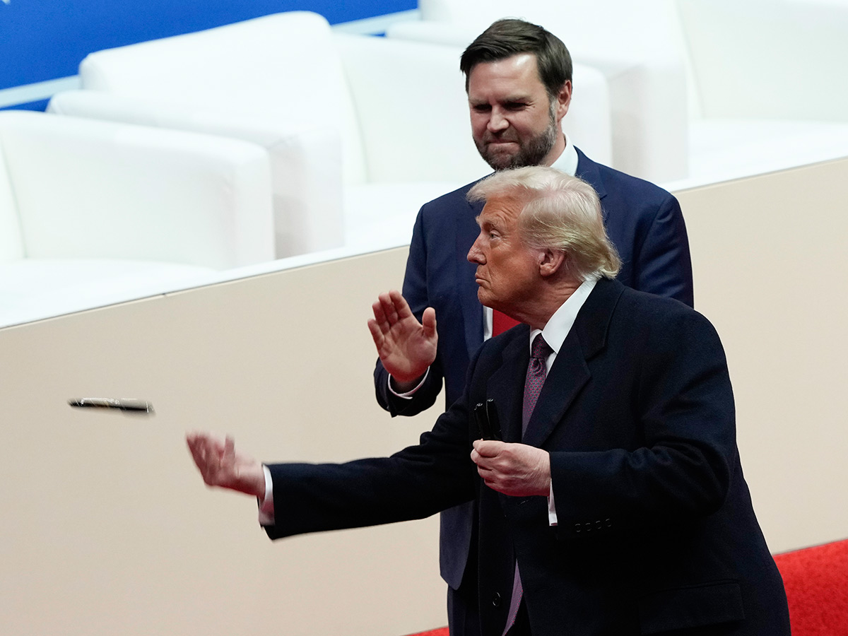 President Donald Trump arrives at an indoor Inauguration parade in Washington25