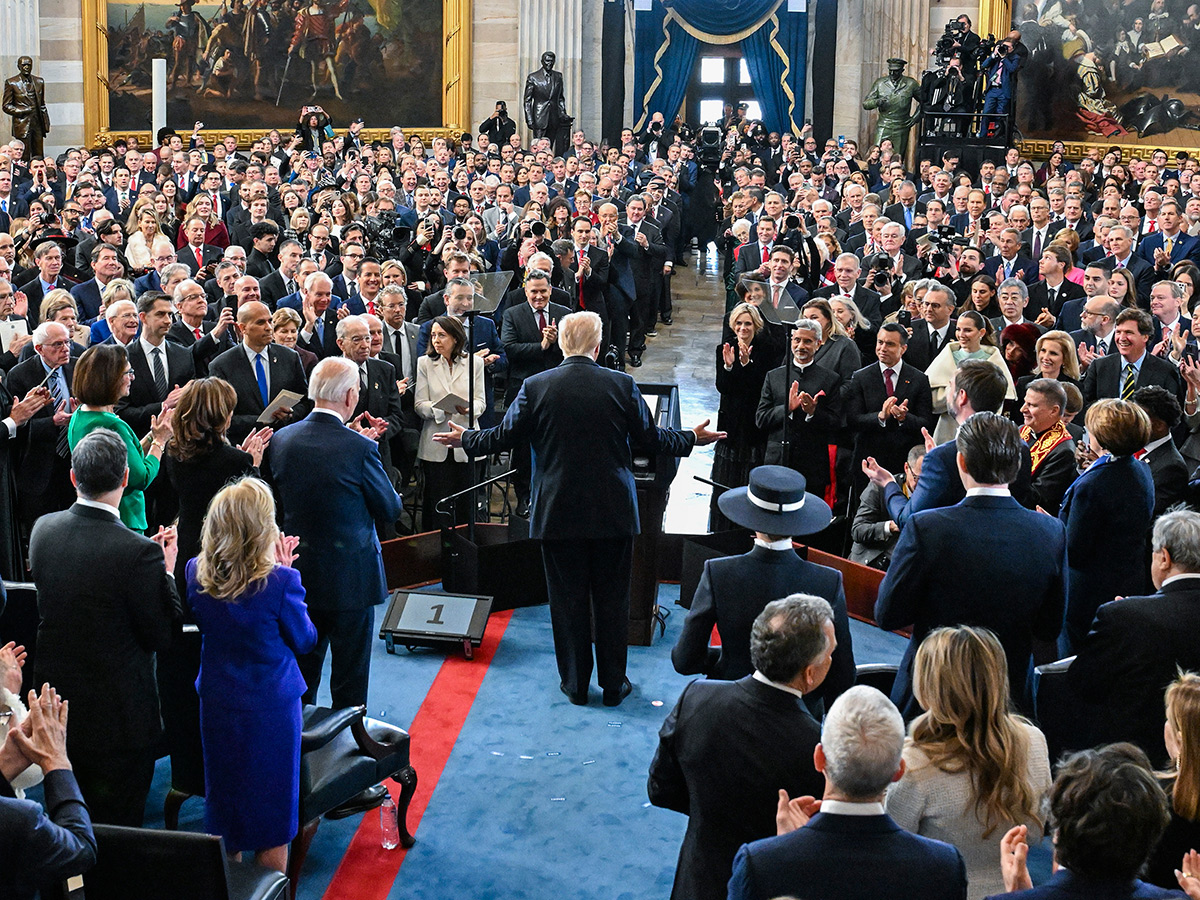 President Donald Trump arrives at an indoor Inauguration parade in Washington9