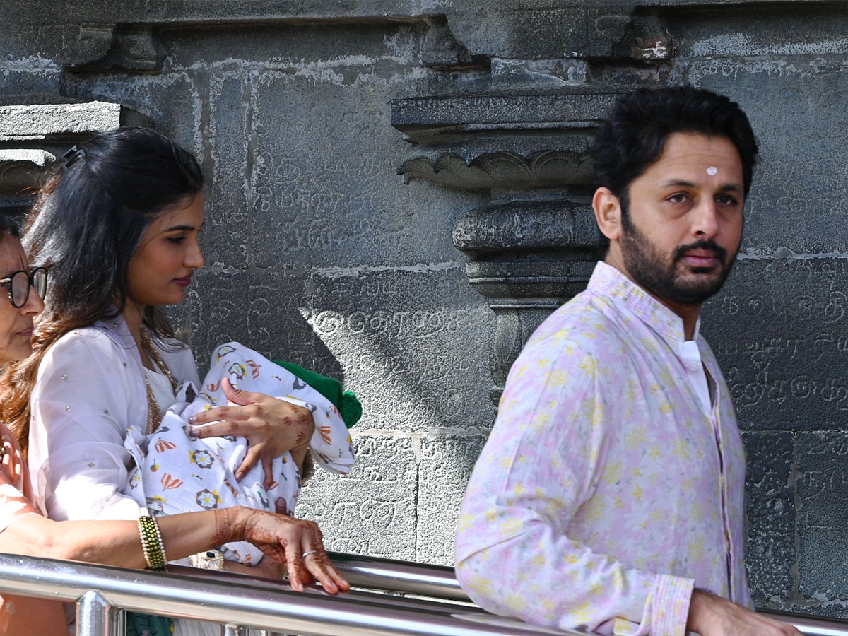 Hero Nithin And Wife Shalini With Son Beautiful Photos At Tirumala Photos5