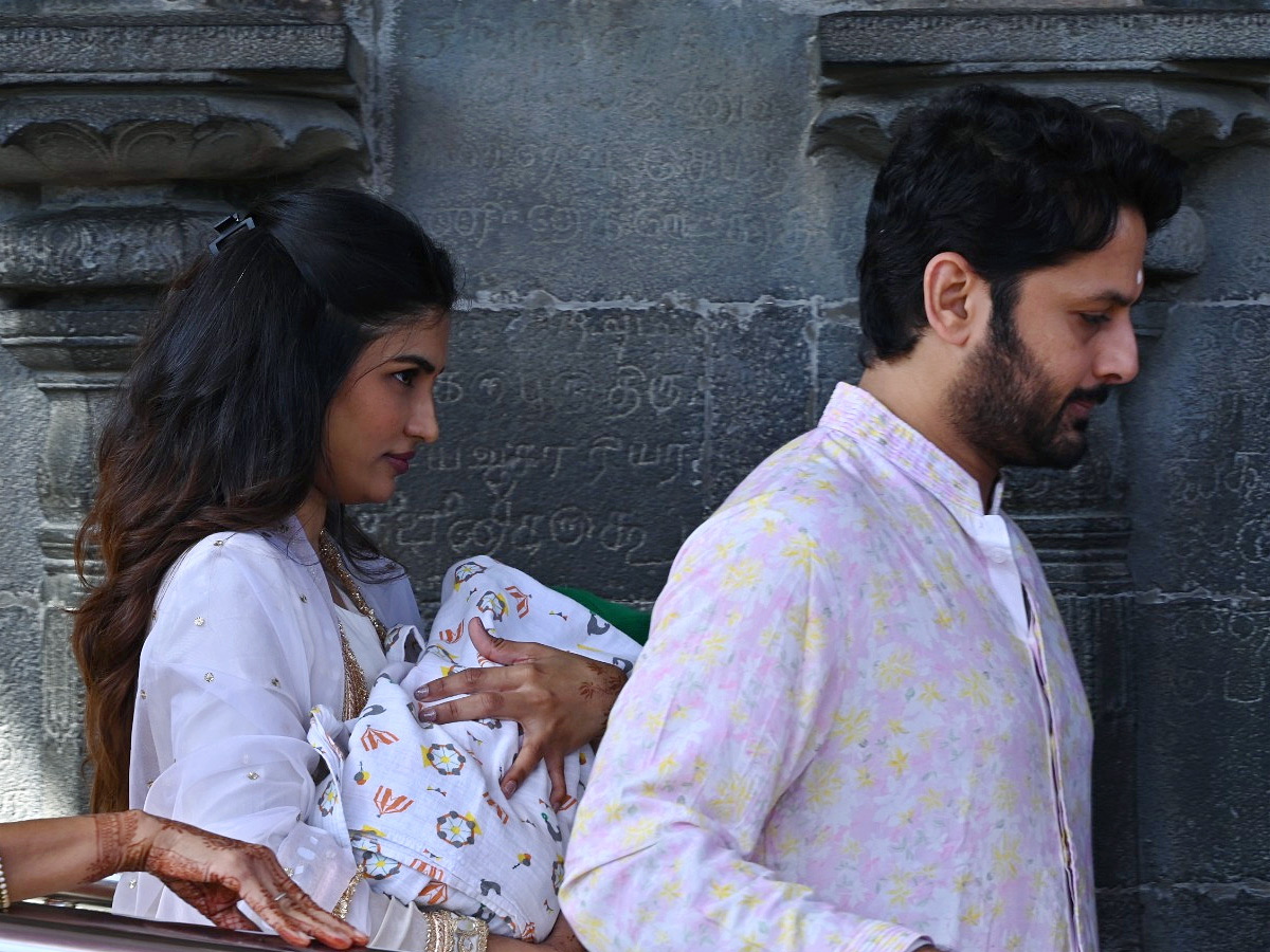 Hero Nithin And Wife Shalini With Son Beautiful Photos At Tirumala Photos6