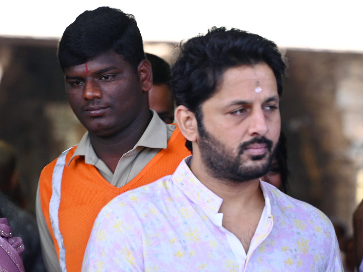 Hero Nithin And Wife Shalini With Son Beautiful Photos At Tirumala Photos16