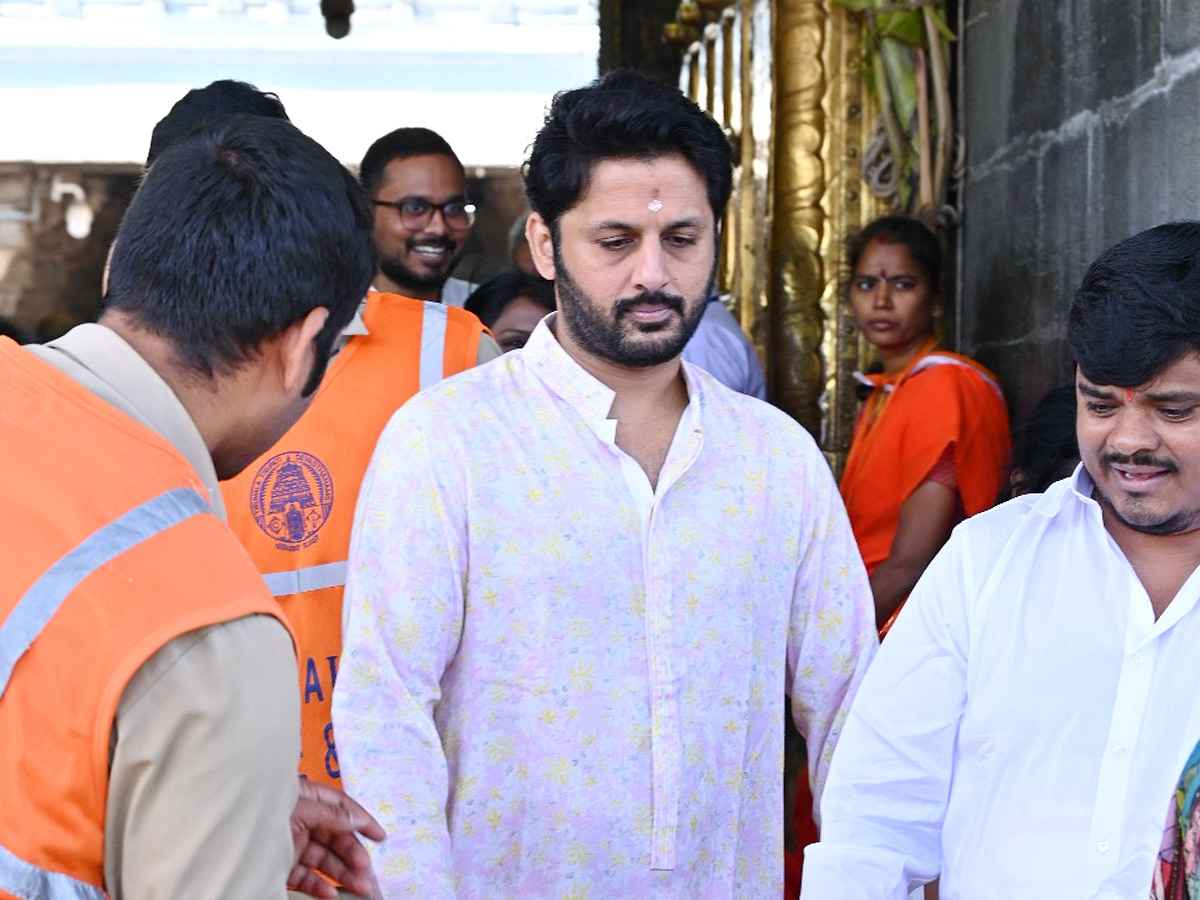 Hero Nithin And Wife Shalini With Son Beautiful Photos At Tirumala Photos17