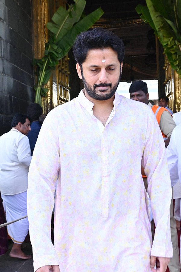 Hero Nithin And Wife Shalini With Son Beautiful Photos At Tirumala Photos20