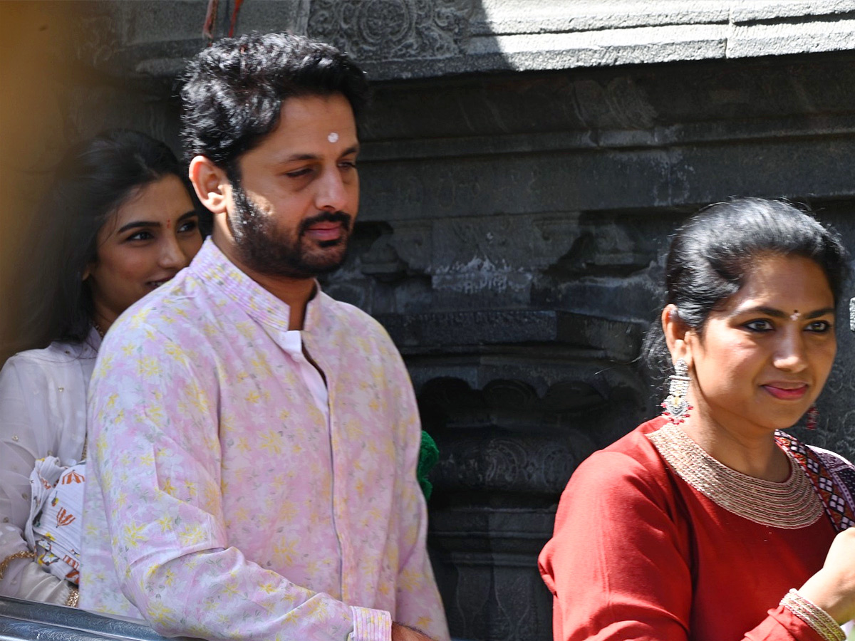 Hero Nithin And Wife Shalini With Son Beautiful Photos At Tirumala Photos7