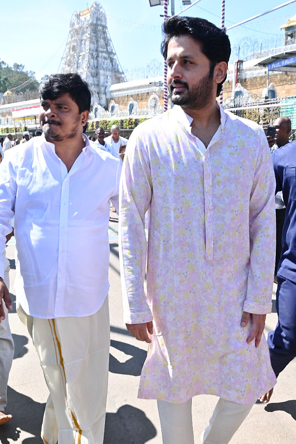 Hero Nithin And Wife Shalini With Son Beautiful Photos At Tirumala Photos11