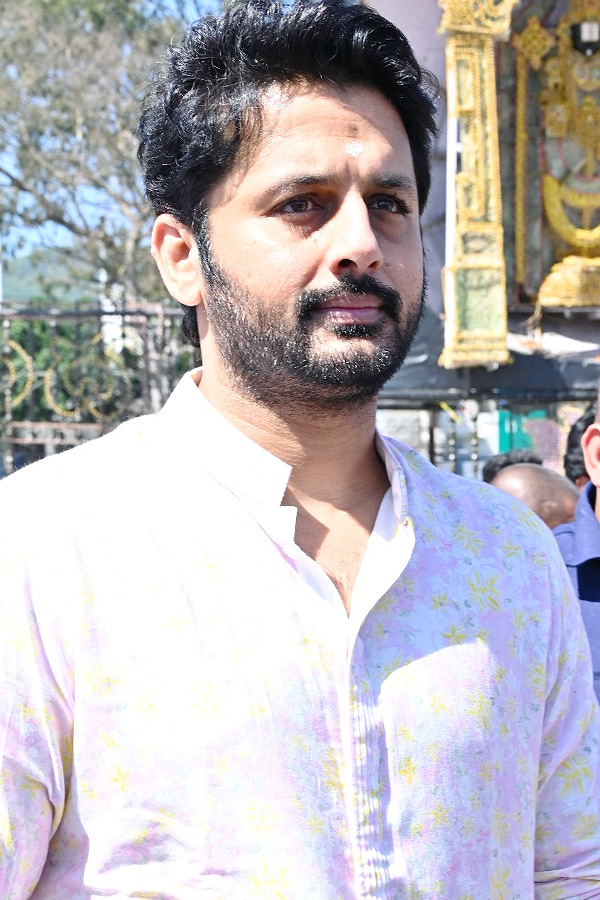 Hero Nithin And Wife Shalini With Son Beautiful Photos At Tirumala Photos13