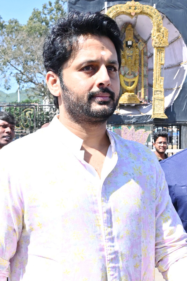 Hero Nithin And Wife Shalini With Son Beautiful Photos At Tirumala Photos14