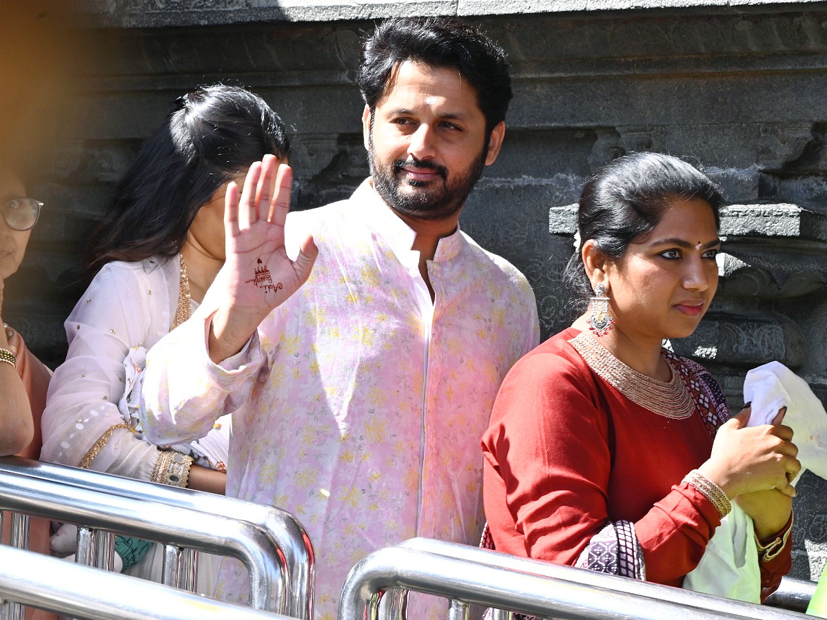 Hero Nithin And Wife Shalini With Son Beautiful Photos At Tirumala Photos3