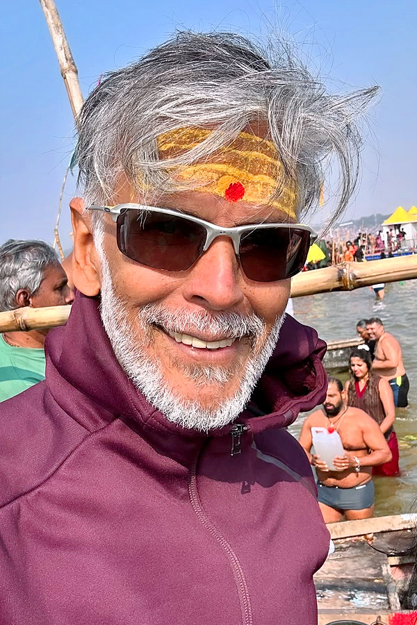 Milind Soman takes holy dip with wife Ankita Konwar at Maha Kumbh Mela Photos13